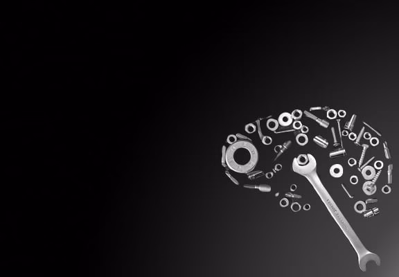 A black background with a brain shaped like a wrench.