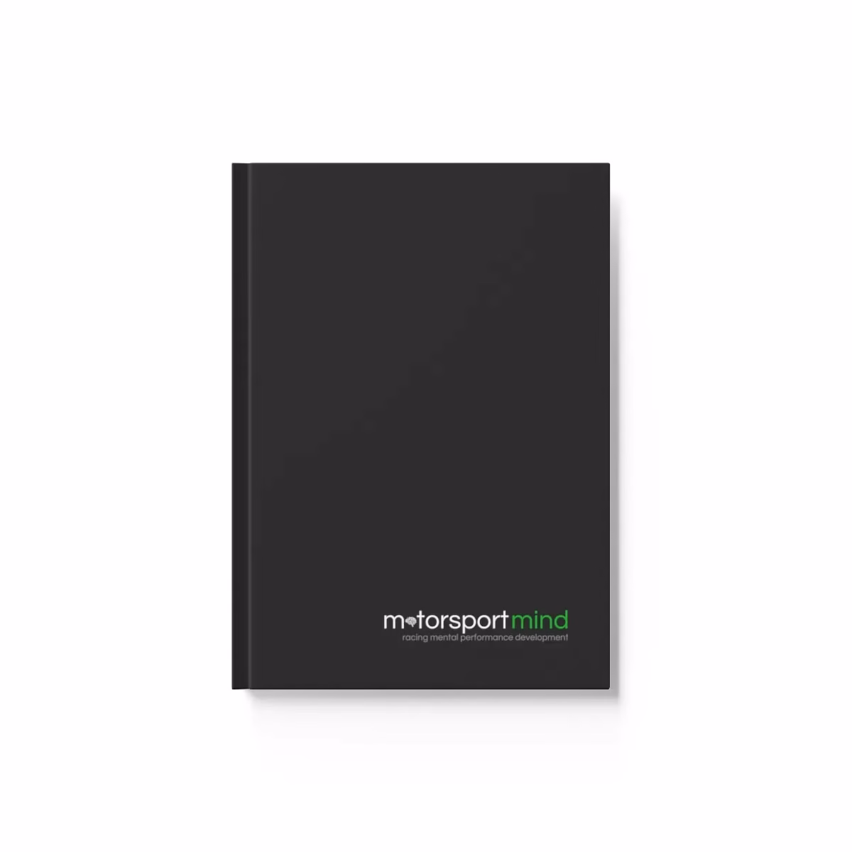 A black Hard Backed Journal with green lettering on it.